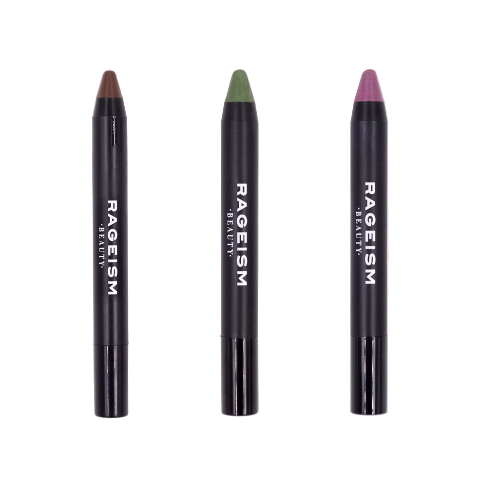 Three cosmetic pencils labeled 'RAEYISM', with the leftmost pencil in brown, the middle in green, and the rightmost in purple color.