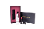 A beauty gift set from Rageism Beauty on a white background, featuring a white serum bottle, a red lipstick, and a black lipstick case, displayed alongside a dark pink inner box and a black outer box with gold lettering.